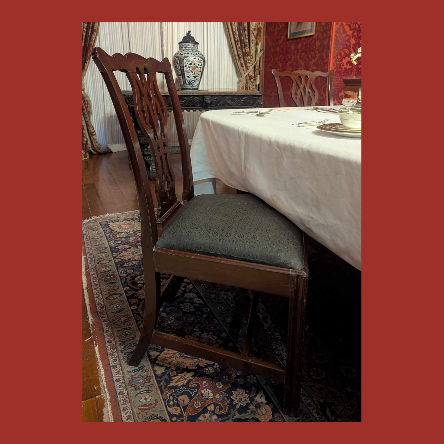 Set of Twelve Chippendale-style Mahogany Dining Room Chairs.